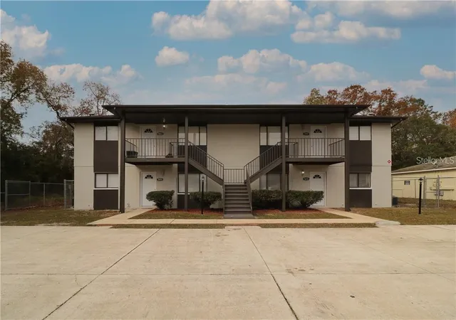 Photo 1 of Multi family home for sale at 7851 Pinehurst Dr, Spring Hill, FL 34606 | MLS# W7890118 | Listing updated on 2026-10-06