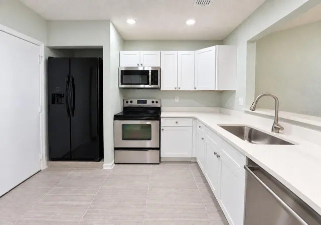 Photo 4 of Townhouse for sale at 3213 Queen Palms Ct, Kissimmee, FL 34747 | MLS# S5158945 | Listing updated on 2026-10-07