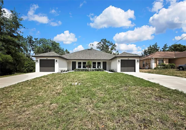 Photo 1 of Multi family home for sale at 2851 Landover Blvd, Spring Hill, FL 34608 | MLS# O6447570 | Listing updated on 2026-10-07