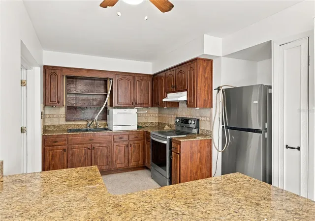 Photo 4 of Single family home for sale at 818 90th Avenue N, Saint Petersburg, FL 33702 | MLS# TB8555299 | Listing updated on 2026-10-07