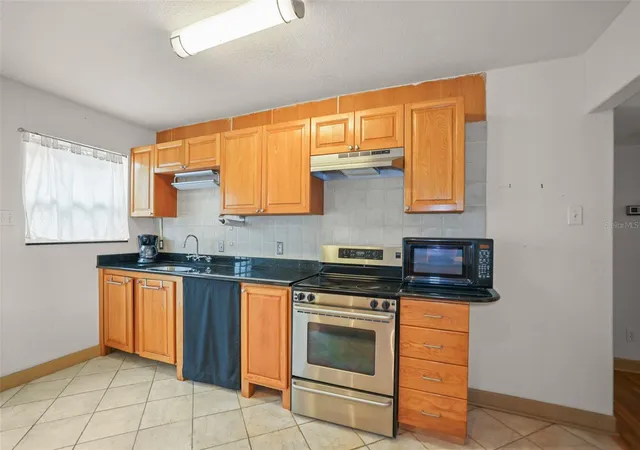 Photo 2 of Single family home for sale at 1559 Bayshore Blvd, Dunedin, FL 34698 | MLS# TB8555335 | Listing updated on 2026-10-07