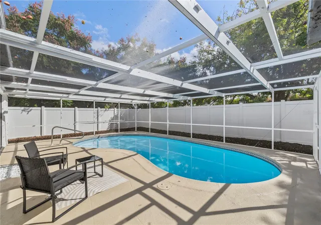 Photo 2 of Single family home for sale at 7010 Parrot Dr, Port Richey, FL 34668 | MLS# W7890126 | Listing updated on 2026-10-21