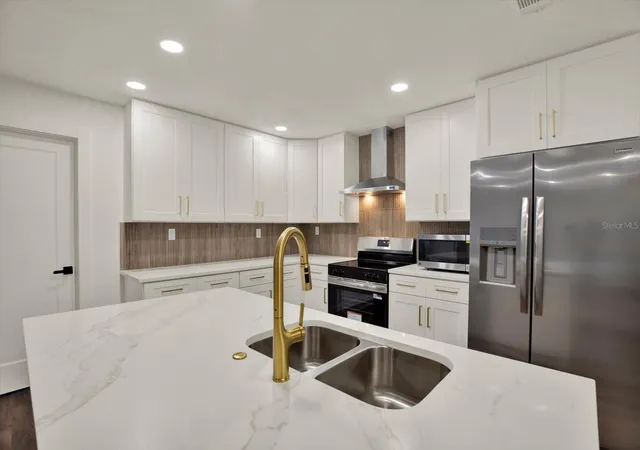 Photo 1 of Single family home for sale at 2661 Pebble Beach Dr, Clearwater, FL 33761 | MLS# TB8555397 | Listing updated on 2026-10-10
