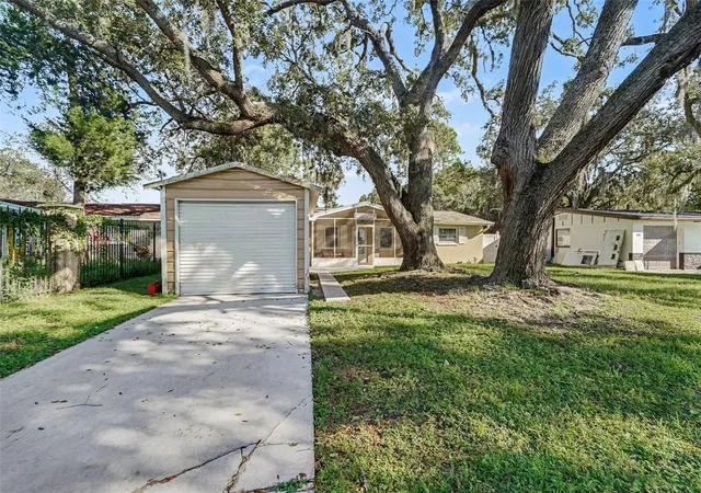 Photo 3 of Single family home for sale at 5818 Baker Rd, New Port Richey, FL 34653 | MLS# TB8555406 | Listing updated on 2026-10-21