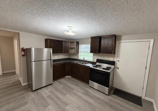 Photo 4 of House for sale at 2006 W Hickory St, Lakeland, FL 33815 | MLS# O6447651 | Listing updated on 2026-10-08