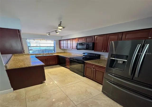 Photo 2 of Townhouse for sale at 7517 Camarina Calle, Tampa, FL 33615 | MLS# TB8555428 | Listing updated on 2026-10-21