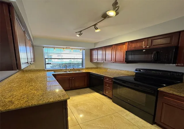 Photo 3 of Townhouse for sale at 7517 Camarina Calle, Tampa, FL 33615 | MLS# TB8555428 | Listing updated on 2026-10-21