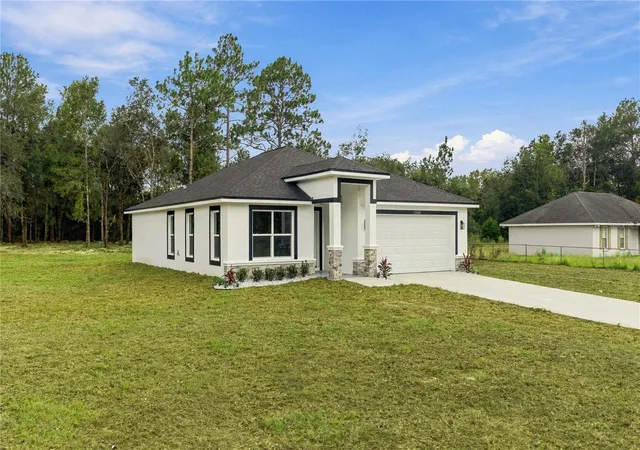 Photo 3 of Single family home for sale at 22010 Sw Beach Blvd, Dunnellon, FL 34431 | MLS# OM733542 | Listing updated on 2026-10-07