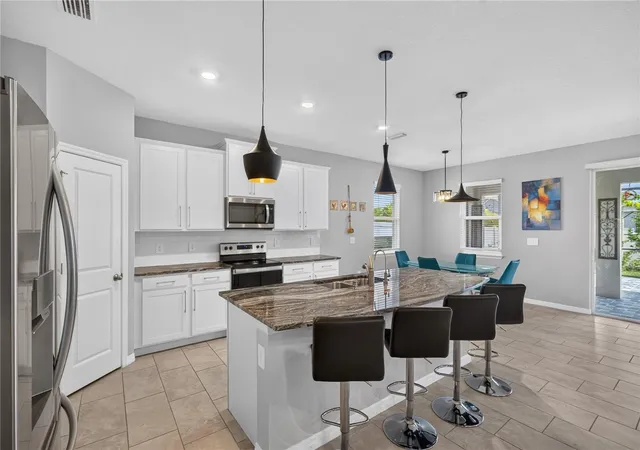 Photo 3 of Single family home for sale at 12704 Lateral Root Dr, Sarasota, FL 34238 | MLS# A4708679 | Listing updated on 2026-10-07