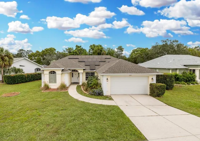 Photo 2 of Single family home for sale at 10435 Audie Brk Dr, Spring Hill, FL 34608 | MLS# W7890136 | Listing updated on 2026-10-08