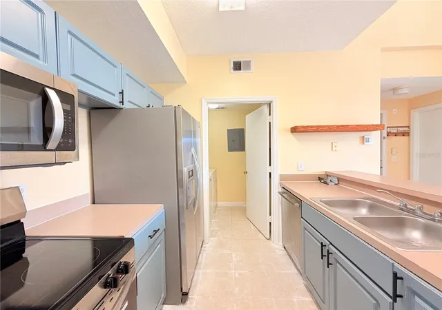 Photo 3 of Condo for sale at 5500 Metrowest Blvd #14-308, Orlando, FL 32811 | MLS# O6447721 | Listing updated on 2026-10-07