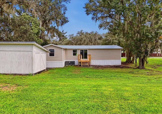 Photo 2 of Manufactured home for sale at 2412 Is Oaks W, Lakeland, FL 33805 | MLS# L4965592 | Listing updated on 2026-10-29