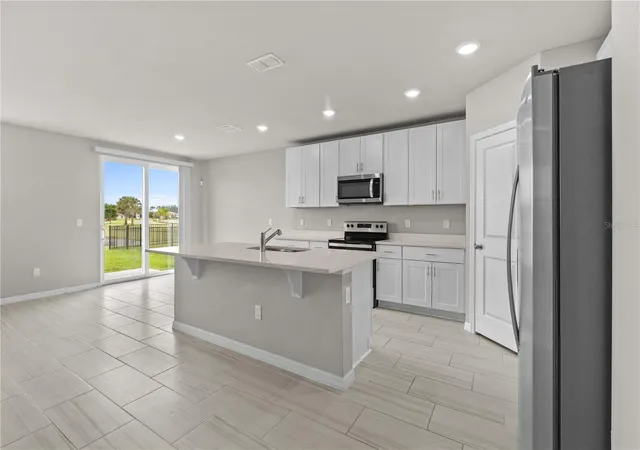 Photo 4 of Single family home for sale at 13911 Richland Gulf Cir, Parrish, FL 34219 | MLS# A4708699 | Listing updated on 2026-10-08