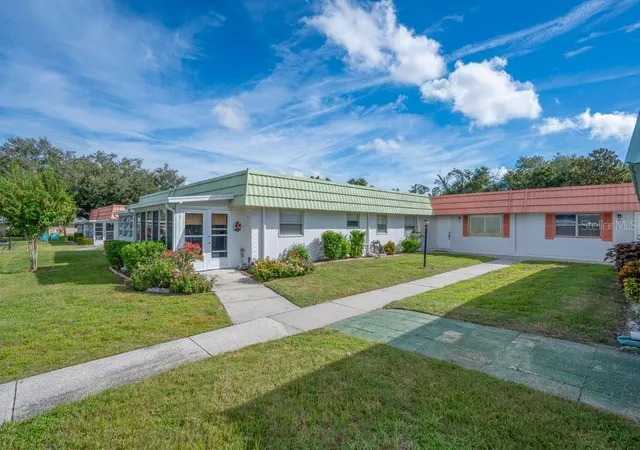 Photo 1 of Condo for sale at 1802 Bedford Ln #9, Sun City Center, FL 33573 | MLS# TB8555518 | Listing updated on 2026-10-09