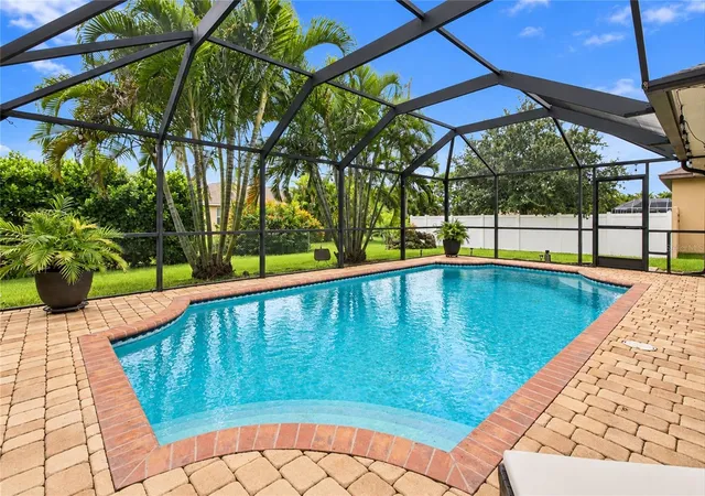 Photo 2 of Single family home for sale at 1412 SW 43rd Terrace, Cape Coral, FL 33914 | MLS# C7531634 | Listing updated on 2026-10-10