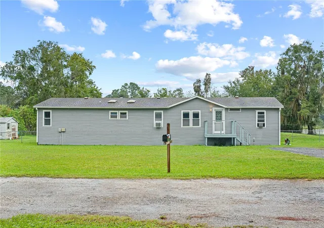 Photo 1 of Single family home for sale at 1903 Alto Ln, Lutz, FL 33558 | MLS# TB8555525 | Listing updated on 2026-10-09