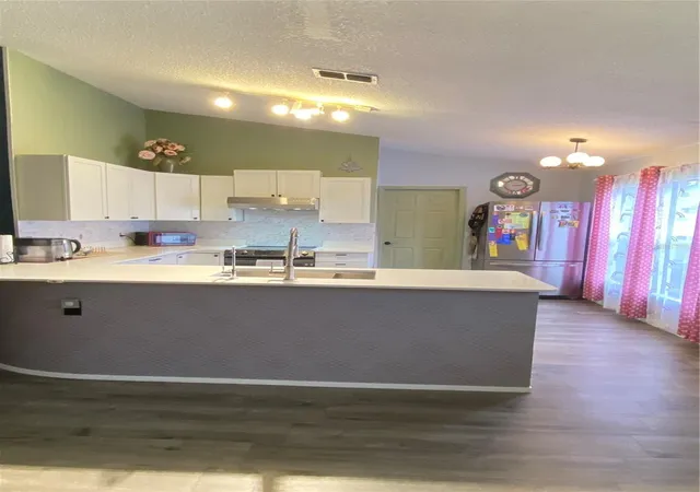 Photo 3 of Single family home for sale at 2419 Pewter Ct, Orlando, FL 32837 | MLS# O6447767 | Listing updated on 2026-10-07