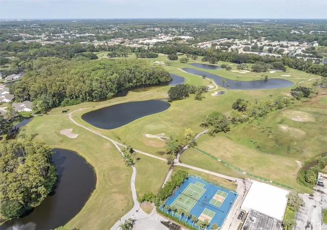 Photo 1 of Condo for sale at 9126 Bassett Ln, New Port Richey, FL 34655 | MLS# W7890141 | Listing updated on 2026-10-12