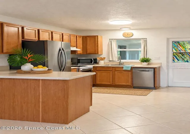 Photo 3 of Condo for sale at 236 Woodland Ave #1, Cocoa Beach, FL 32931 | MLS# O6447805 | Listing updated on 2026-10-07