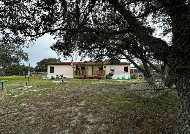Photo 2 of Manufactured home for sale at 13451 Se 98th Street, Dunnellon, FL 34431 | MLS# OM733573 | Listing updated on 2026-10-08