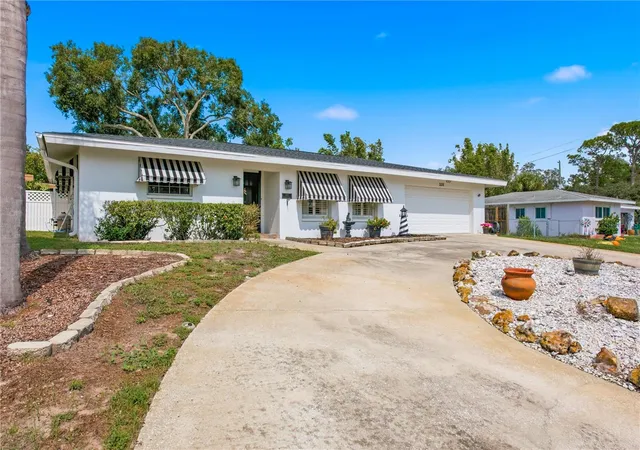 Photo 3 of Single family home for sale at 233 Westwinds Dr, Palm Harbor, FL 34683 | MLS# W7890151 | Listing updated on 2026-10-12