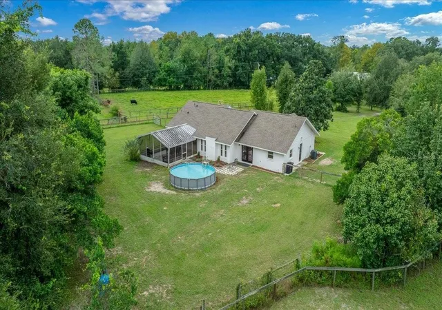 Photo 2 of Single family home for sale at 14871 SE 41st Court, Summerfield, FL 34491 | MLS# O6447864 | Listing updated on 2026-10-09