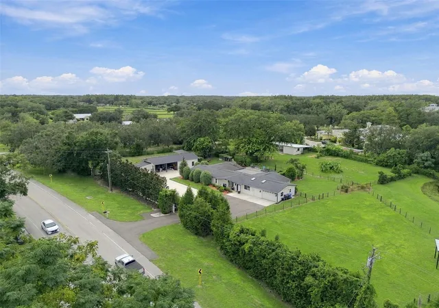 Photo 2 of Single family home for sale at 19902 Gunn Hwy, Odessa, FL 33556 | MLS# W7890154 | Listing updated on 2026-10-07
