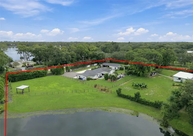 Photo 3 of Single family home for sale at 19902 Gunn Hwy, Odessa, FL 33556 | MLS# W7890154 | Listing updated on 2026-10-07