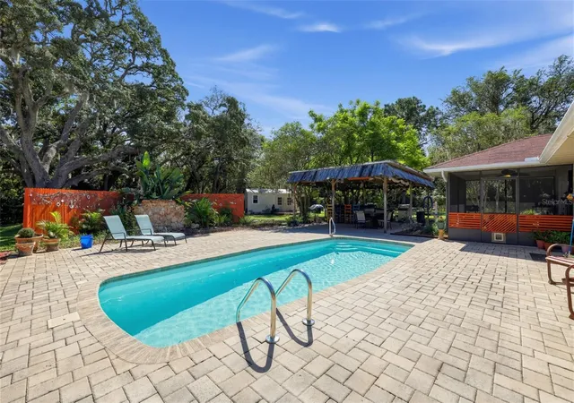 Photo 3 of Single family home for sale at 9124 Flint St, New Port Richey, FL 34654 | MLS# TB8555668 | Listing updated on 2026-10-17