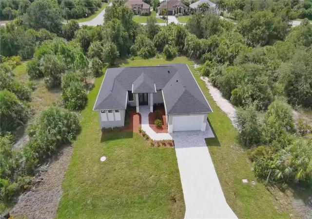 Photo 2 of Single family home for sale at 14265 Fort Myers Ave, Port Charlotte, FL 33981 | MLS# O6447884 | Listing updated on 2026-10-07