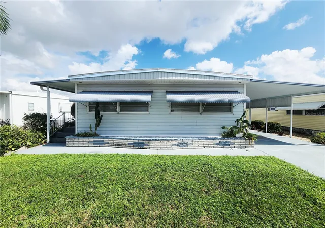 Photo 1 of Manufactured home for sale at 5317 Chateau Ln, Bradenton, FL 34207 | MLS# A4708768 | Listing updated on 2026-10-10