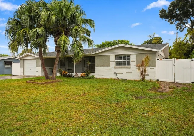 Photo 1 of Single family home for sale at 5223 Drift Tide Dr, New Port Richey, FL 34652 | MLS# TB8555682 | Listing updated on 2026-10-07