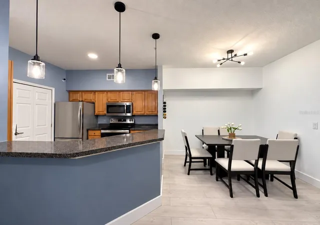 Photo 3 of Condo for sale at 5961 Westgate Dr #2023, Orlando, FL 32835 | MLS# O6447915 | Listing updated on 2026-10-07