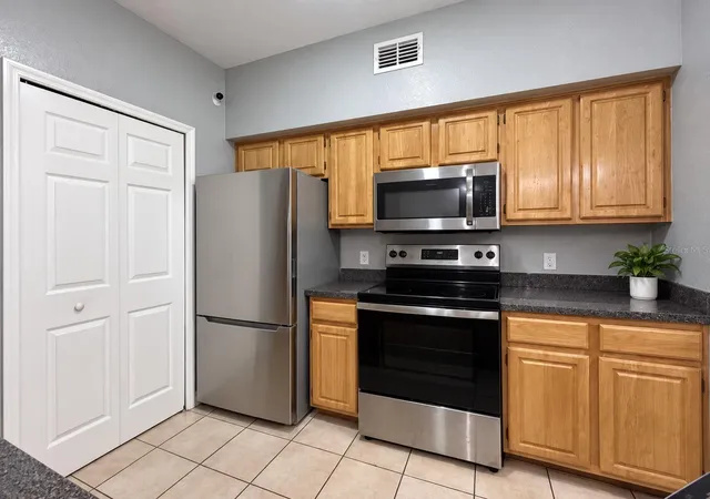 Photo 4 of Condo for sale at 5961 Westgate Dr #2023, Orlando, FL 32835 | MLS# O6447915 | Listing updated on 2026-10-07