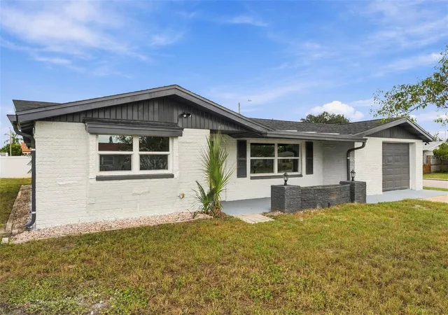 Photo 3 of Single family home for sale at 10734 Leeds Rd, Port Richey, FL 34668 | MLS# W7890159 | Listing updated on 2026-10-09