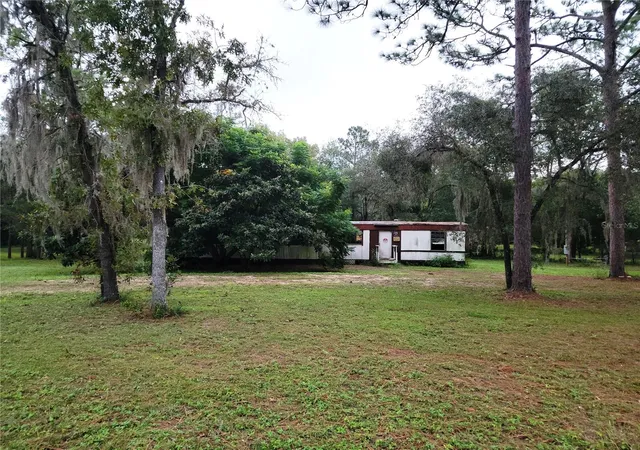 Photo 1 of Manufactured home for sale at 12231 NE 64 Place, Williston, FL 32696 | MLS# OM733597 | Listing updated on 2026-10-07