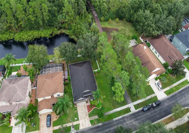 Photo 3 of Single family home for sale at 27537 Edenfield Dr, Wesley Chapel, FL 33544 | MLS# TB8555753 | Listing updated on 2026-10-10