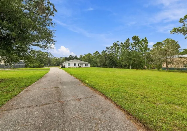 Photo 2 of Single family home for sale at 7405 Miracle Ln, Odessa, FL 33556 | MLS# TB8555782 | Listing updated on 2026-10-07