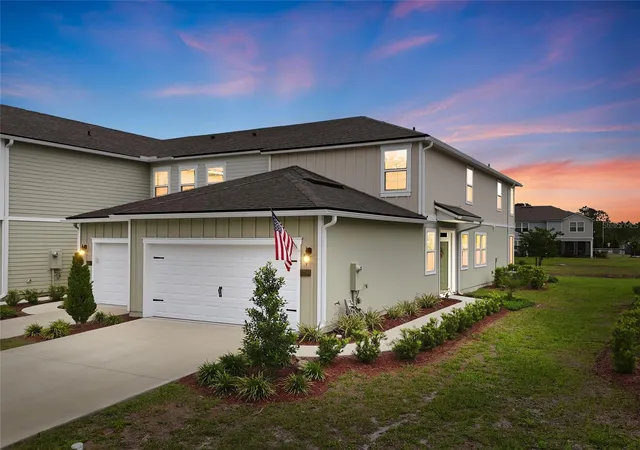 Photo 1 of Townhouse for sale at 338 Redbud Rd, Palm Coast, FL 32137 | MLS# FC321979 | Listing updated on 2026-10-08