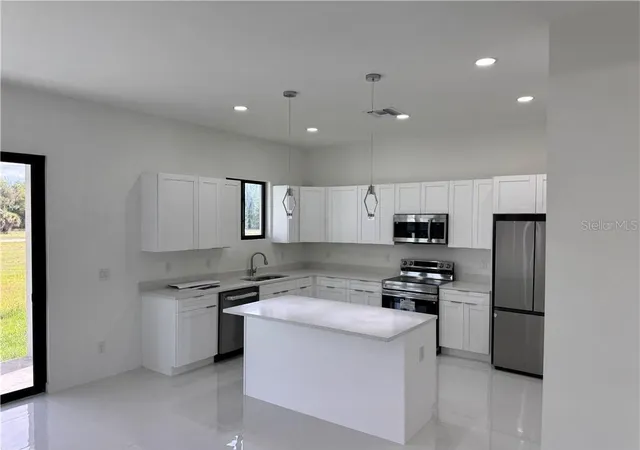 Photo 4 of Single family home for sale at 4121 NW 22nd Street, Cape Coral, FL 33993 | MLS# O6448016 | Listing updated on 2026-10-08