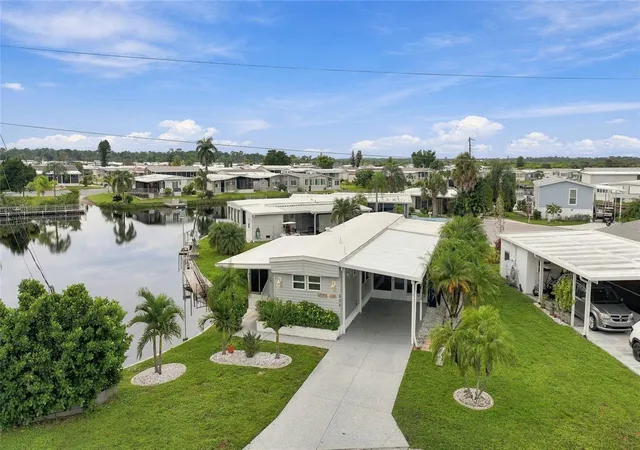 Photo 3 of Manufactured home for sale at 503 Aljo Pl, North Port, FL 34287 | MLS# C7531684 | Listing updated on 2026-10-08