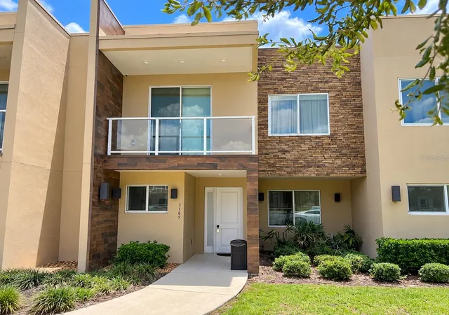 Photo 1 of Townhouse for sale at 3165 Pantanal Ln, Kissimmee, FL 34747 | MLS# O6448032 | Listing updated on 2026-10-17