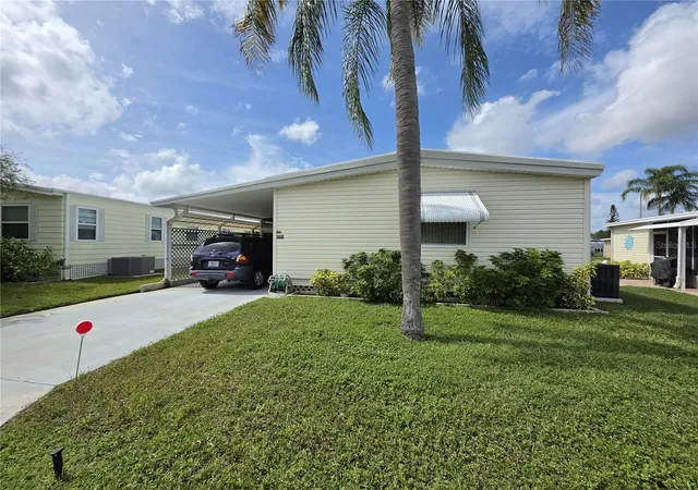 Photo 1 of Manufactured home for sale at 5293 Poinciana Cir, New Port Richey, FL 34653 | MLS# W7890166 | Listing updated on 2026-10-08