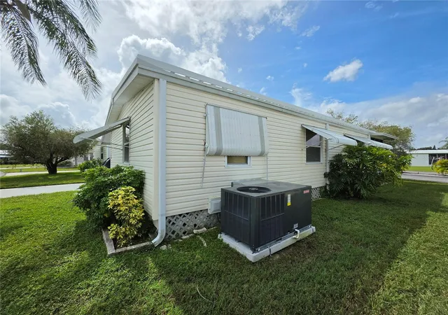 Photo 2 of Manufactured home for sale at 5293 Poinciana Cir, New Port Richey, FL 34653 | MLS# W7890166 | Listing updated on 2026-10-08