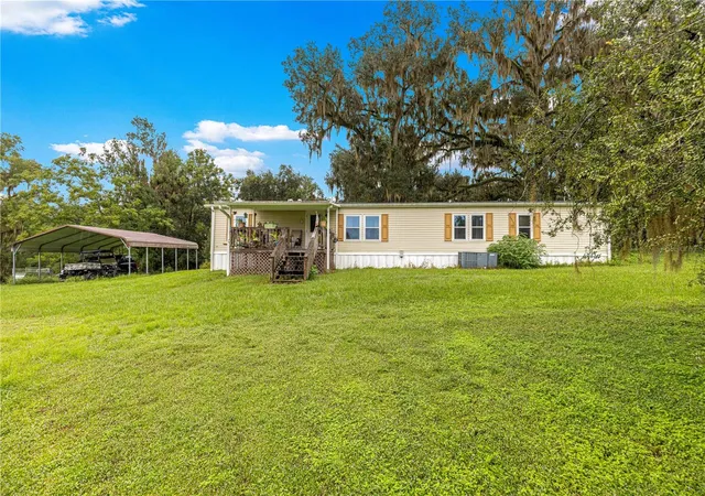 Photo 1 of Manufactured home for sale at 5135 Se 125th Street, Belleview, FL 34420 | MLS# OM733629 | Listing updated on 2026-10-09