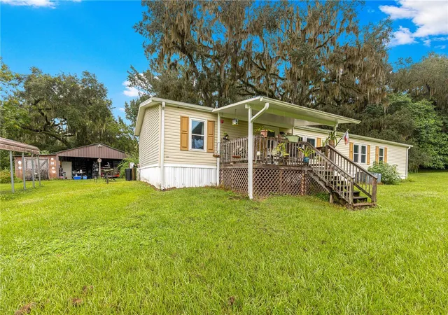 Photo 3 of Manufactured home for sale at 5135 Se 125th Street, Belleview, FL 34420 | MLS# OM733629 | Listing updated on 2026-10-09