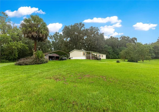 Photo 4 of Manufactured home for sale at 5135 SE 125th Street, Belleview, FL 34420 | MLS# OM733629 | Listing updated on 2026-10-09