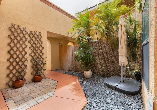 Photo 2 of Townhouse for sale at 7711 Sugar Bnd Dr, Orlando, FL 32819 | MLS# O6448075 | Listing updated on 2026-10-24