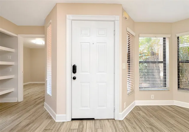 Photo 3 of Townhouse for sale at 7711 Sugar Bnd Dr, Orlando, FL 32819 | MLS# O6448075 | Listing updated on 2026-10-24