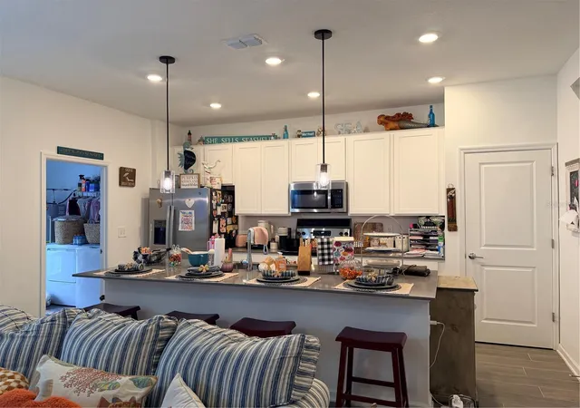 Photo 2 of Townhouse for sale at 10606 Words Dr, Winter Garden, FL 34787 | MLS# O6448083 | Listing updated on 2026-10-22